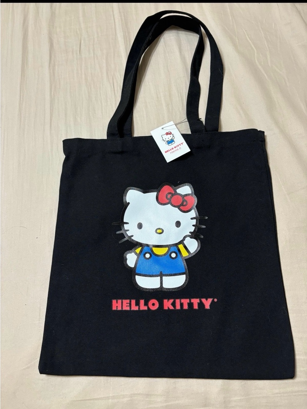 Hello Kitty Black Tote with Red Bow and Blue Outfit